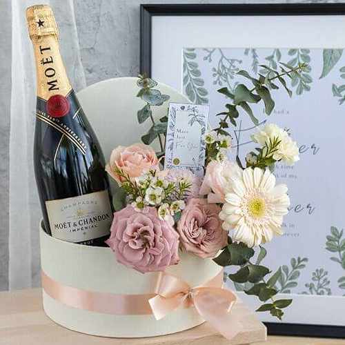 Moet And Flowers In Rounded Box-Best Wine Gift Baskets To Singapore